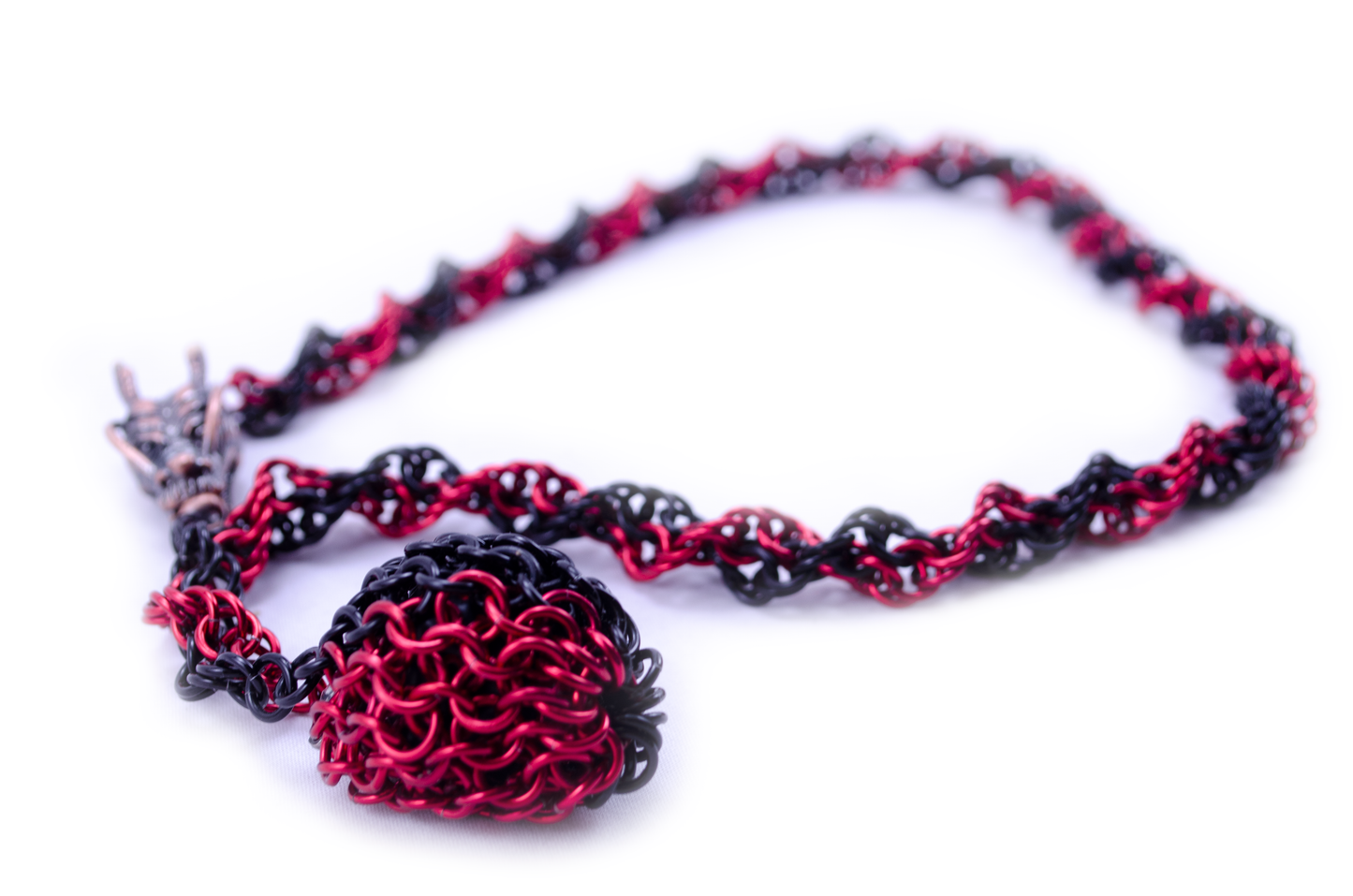 D20 captured necklace with dragon head clasp